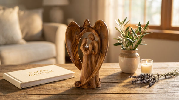 Statue of a couple under angel wings. Perfect for a Weddings or Anniversary gift